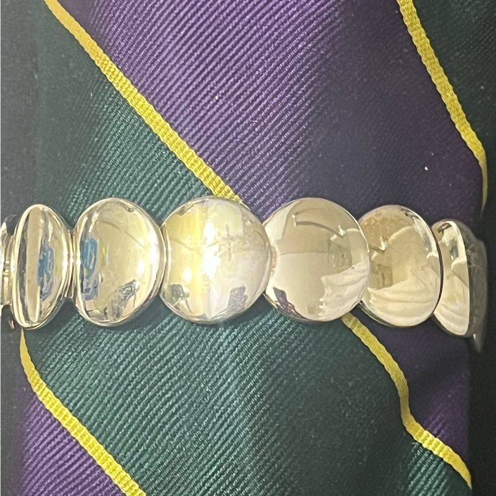 Bracelet stretch silver tone disc